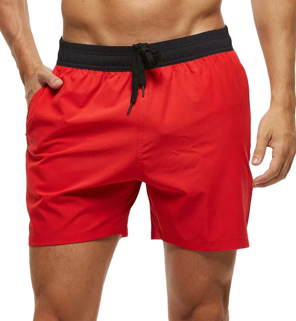 Men's blue fitness shorts with a drawstring waistband and a side zipper pocket.