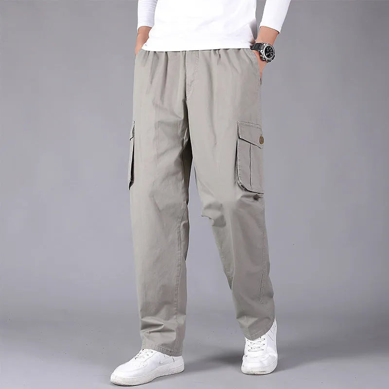 Cotton loose straight leg cargo trousers in black with multiple pockets and zip fly