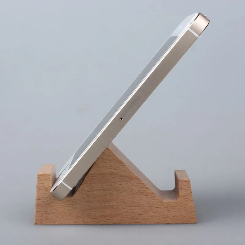 Handcrafted beech wood and resin lazy bracket mobile phone holder on a wooden desk