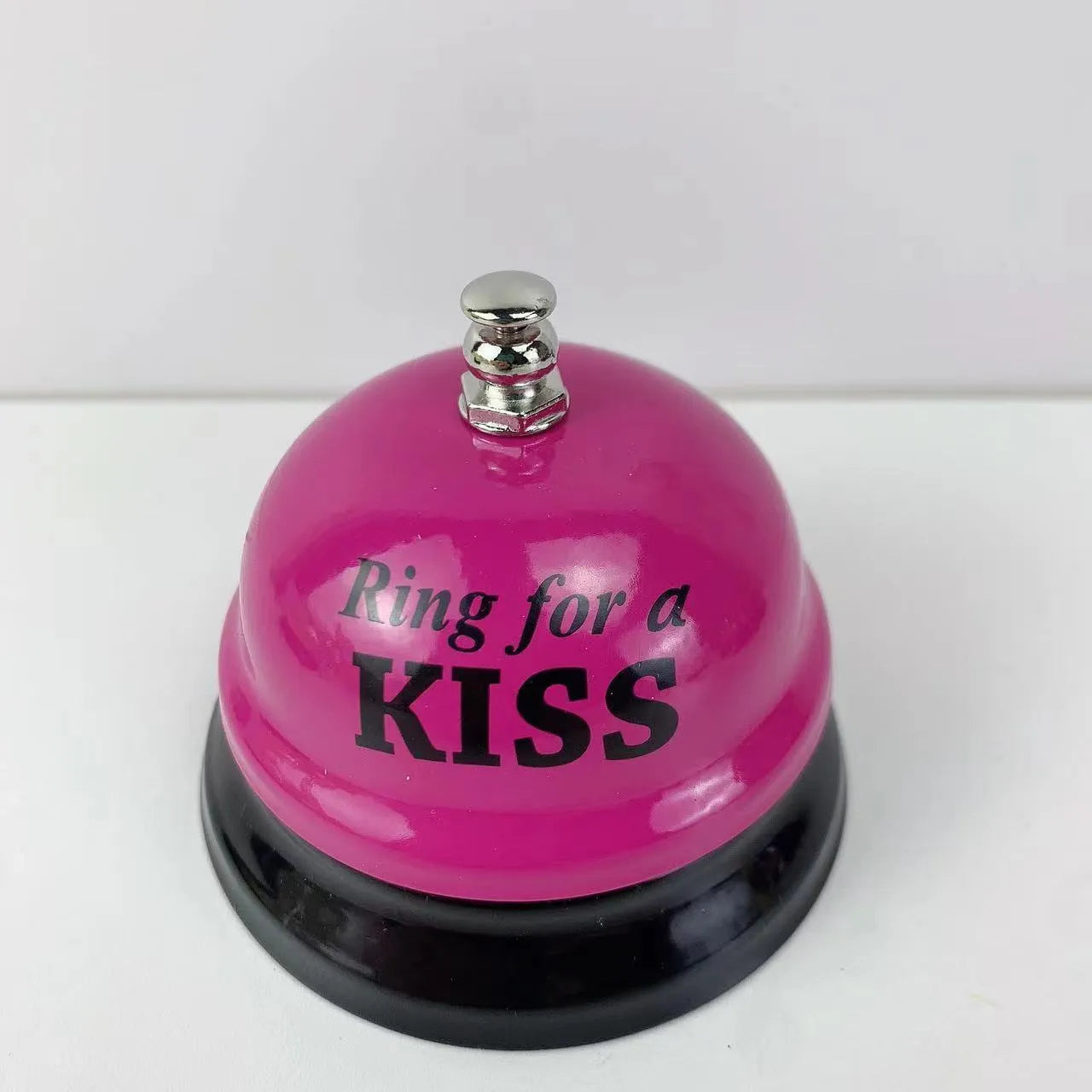 Iron game bell in assorted colours including red, blue, green, pink, and yellow for service or classroom use.
