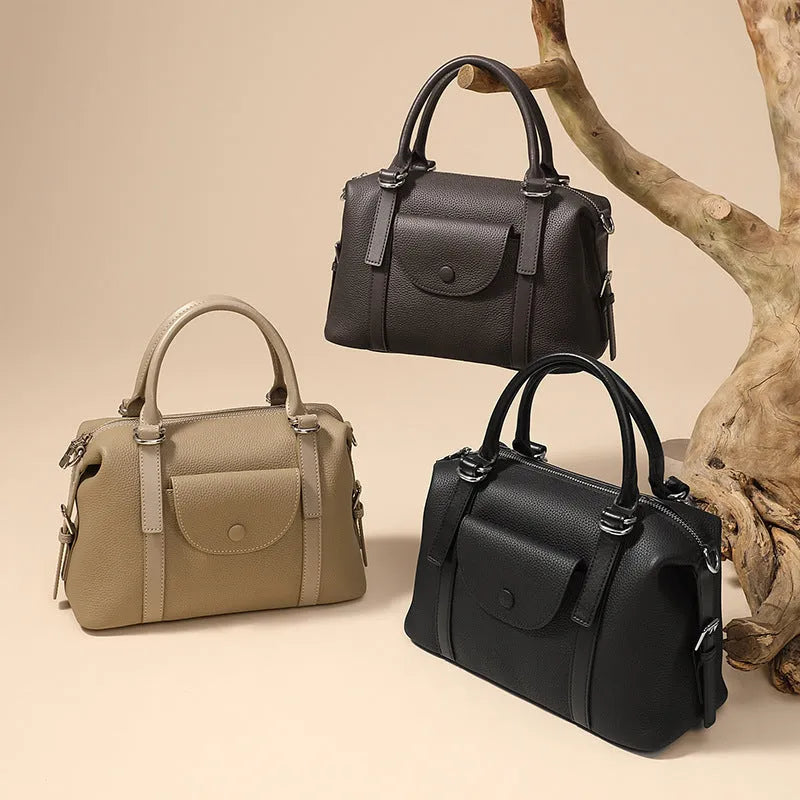 Genuine leather ladies' shoulder bag with stitching details and lock fastening in three colour options