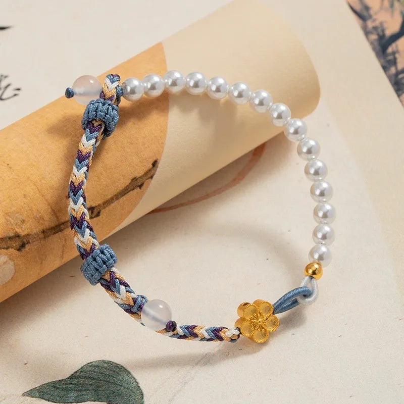 Peach-coloured sterling silver bracelet with Chinese flower weaving and pearl decoration