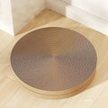 Round green and white corrugated paper cat scratching board with a 55 cm diameter.