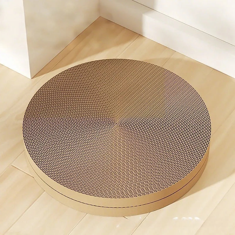 Round green and white corrugated paper cat scratching board with a 55 cm diameter.