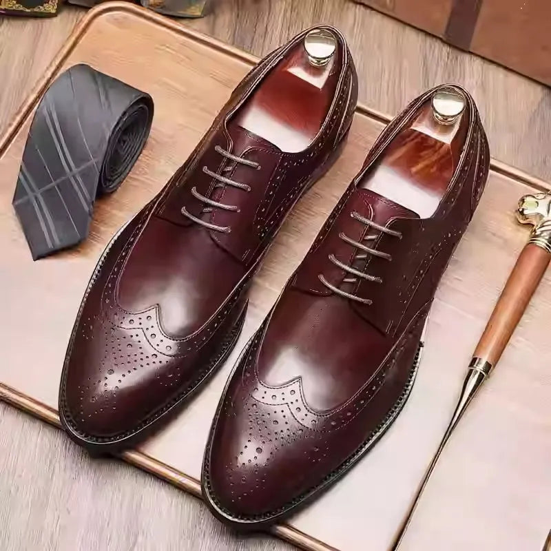 Men's black pointed toe Oxford leather shoes with carved brogue patterns and low heel
