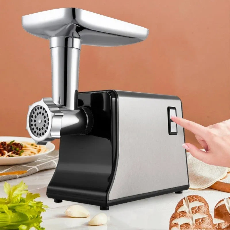 Silver meat grinder with double mixing blade on countertop, 33.5cm tall, aluminium tray and straight head visible