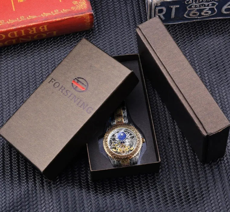 Men's automatic mechanical watch with hollow retro carved dial, moon phase display, stainless steel strap, 44mm gold finish