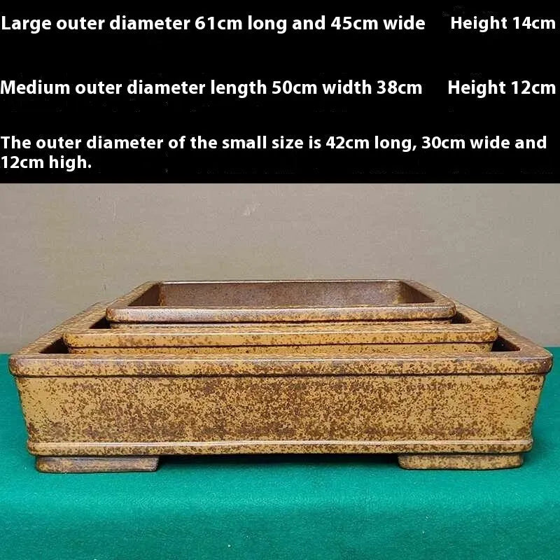 Straight-sided rectangular Yixing Zisha shallow flowerpot made of purple sand clay.