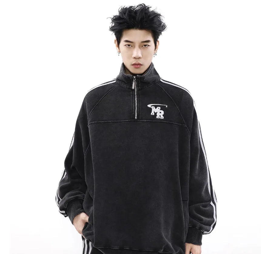 Black Hong Kong style stand collar couple hoodie sweater on a hanger.