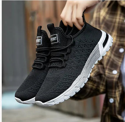 Men's solid colour casual shoes with a mesh upper, shown in multiple available colours.