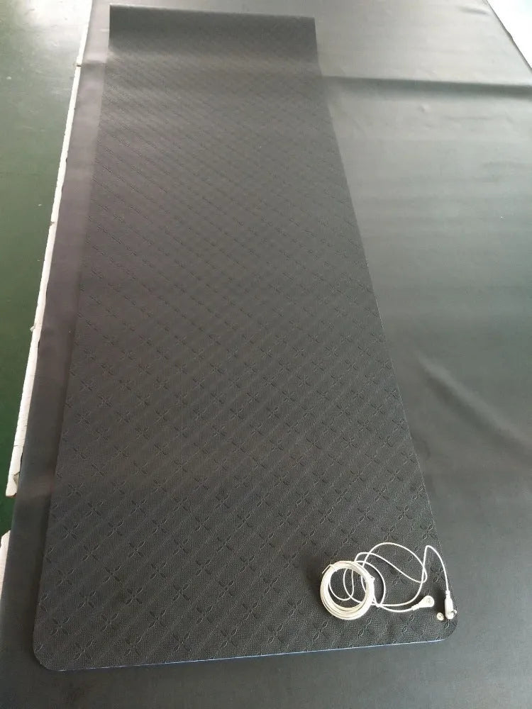 Blue conductive yoga mat with grounding wire and plant pattern, measuring 182x61cm