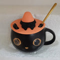 Black cat-shaped ceramic mug with pumpkin decoration and 355ml capacity