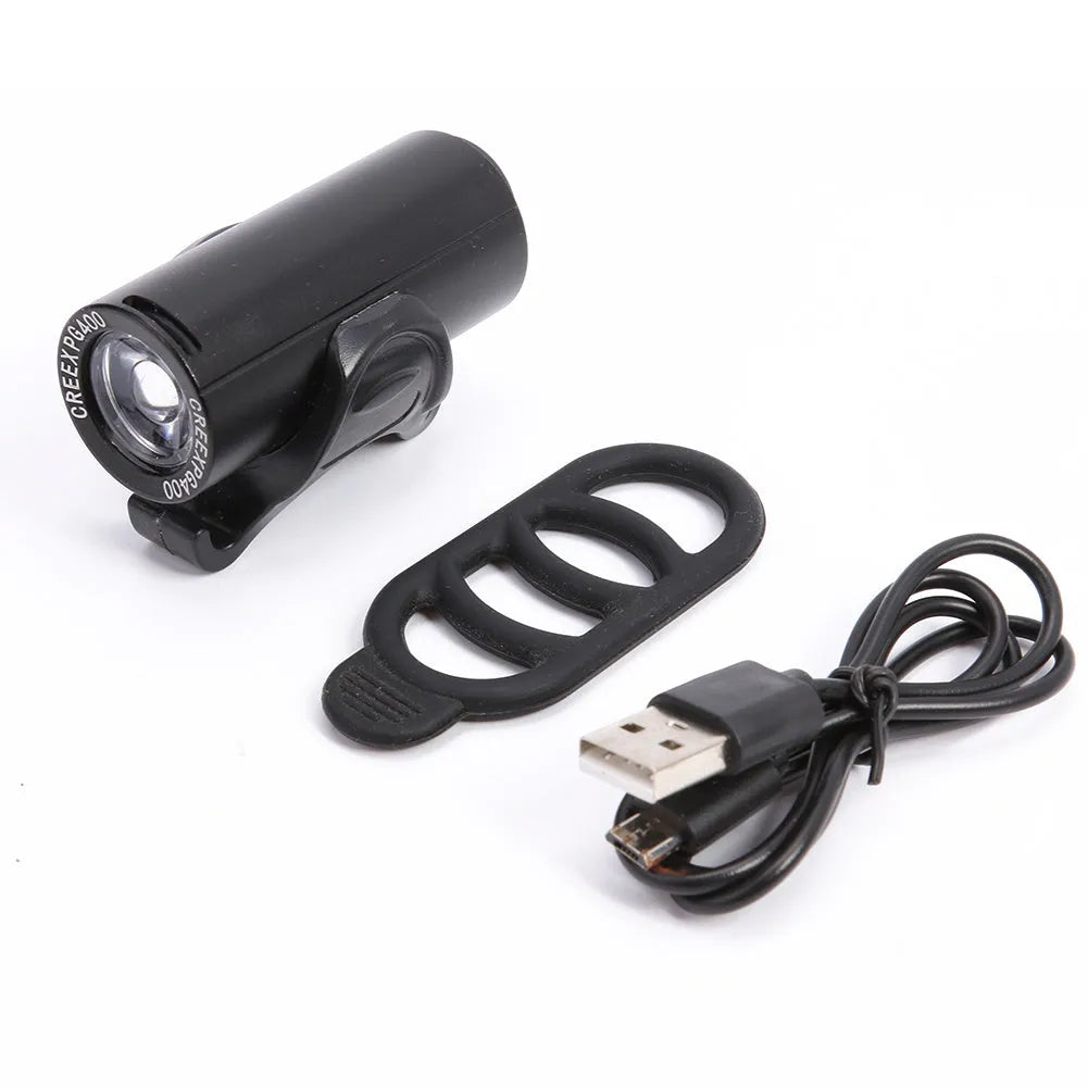 Black USB rechargeable bicycle front light with 350 lumen output and adjustable strap mount