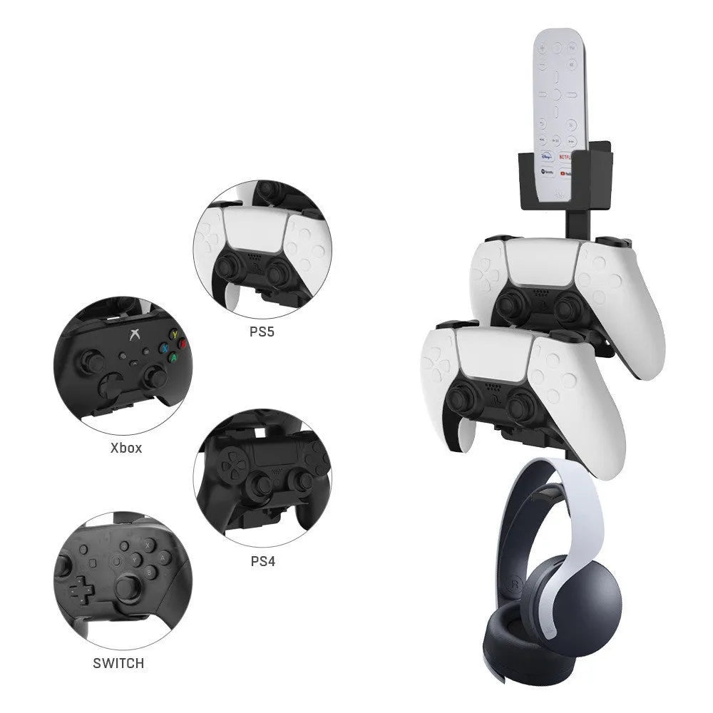 White wall-mounted storage hook holding PS5 controller and headphones