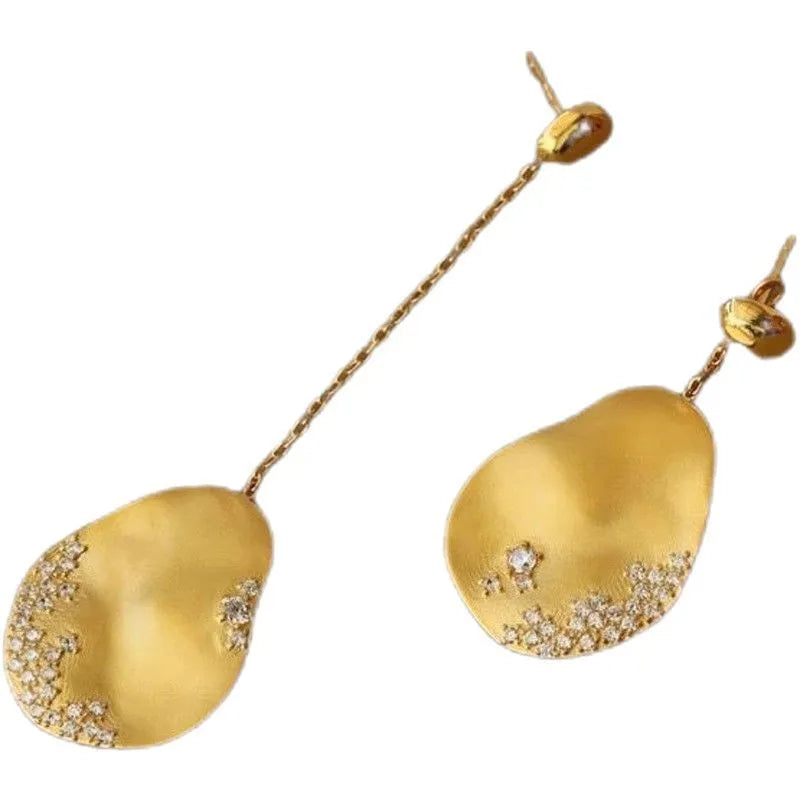 Asymmetric Chinese style earrings with gold-plated finish and zircon flower design in silver tone