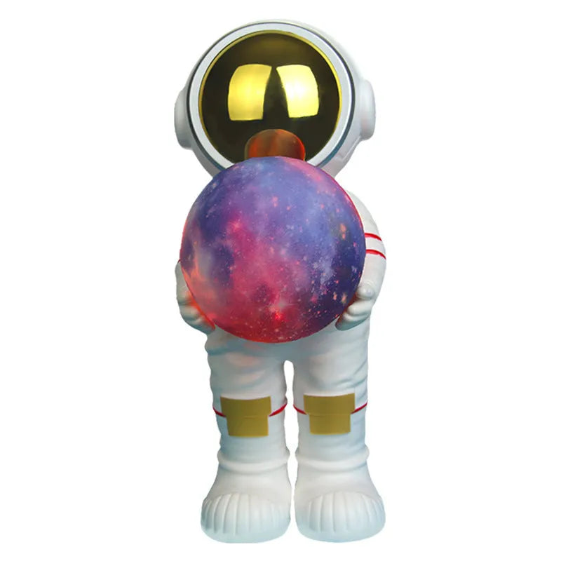 Spaceman starry sky projection lamp on a table, showing star pattern projection