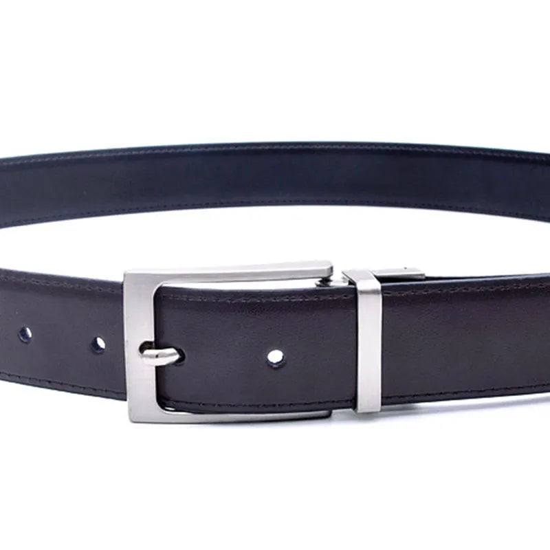 Men's brown and black genuine leather belt with a silver rotating pin buckle on a dark background.