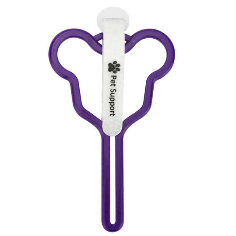 A dog poo bag holder with a hands-free clip and black Velcro strap attached to a leash.