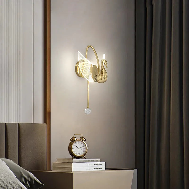 Modern gold swan neck bedside wall lamp with an acrylic shade and dimmable LED light.