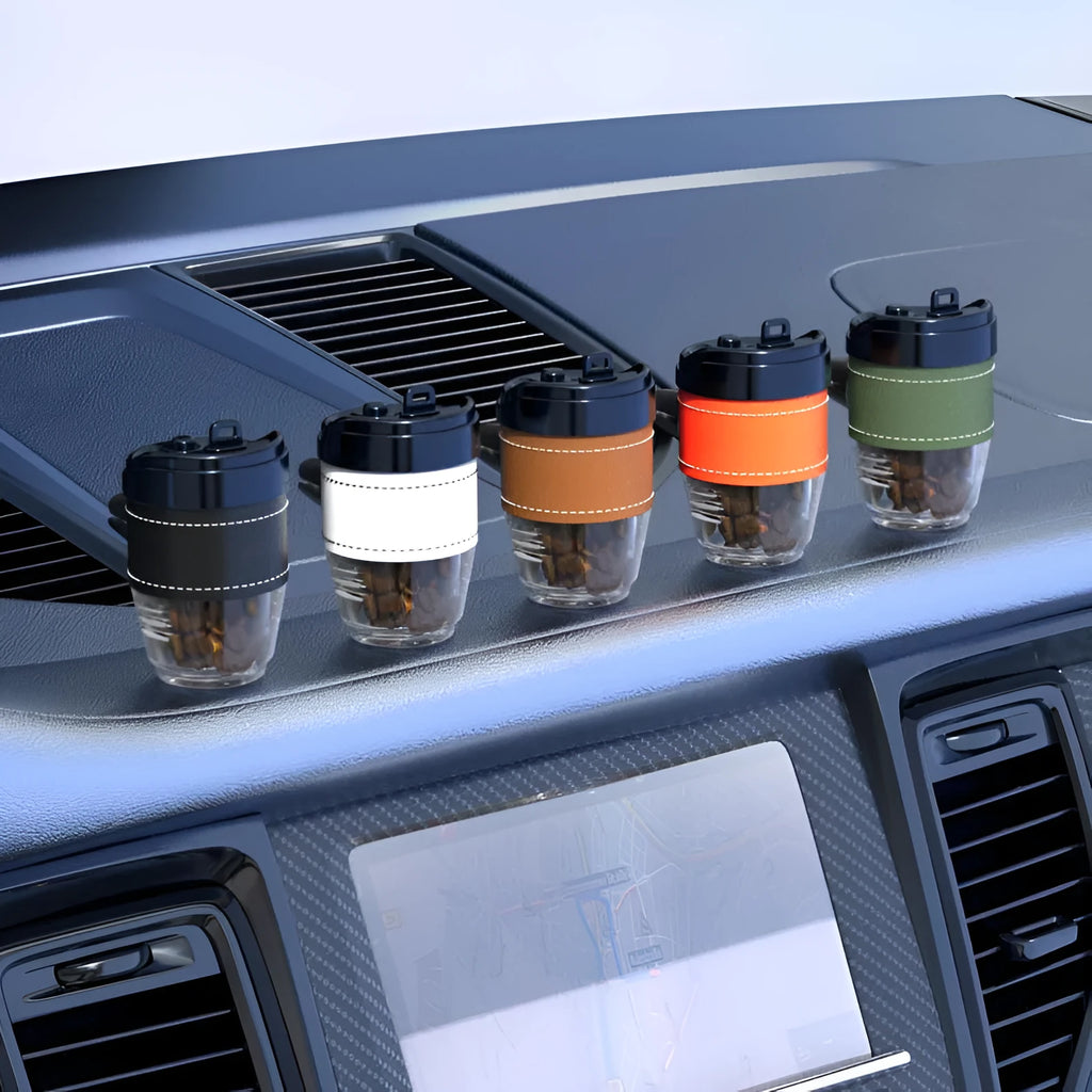 Coffee cup shaped car air freshener in plastic construction with coffee beans scent