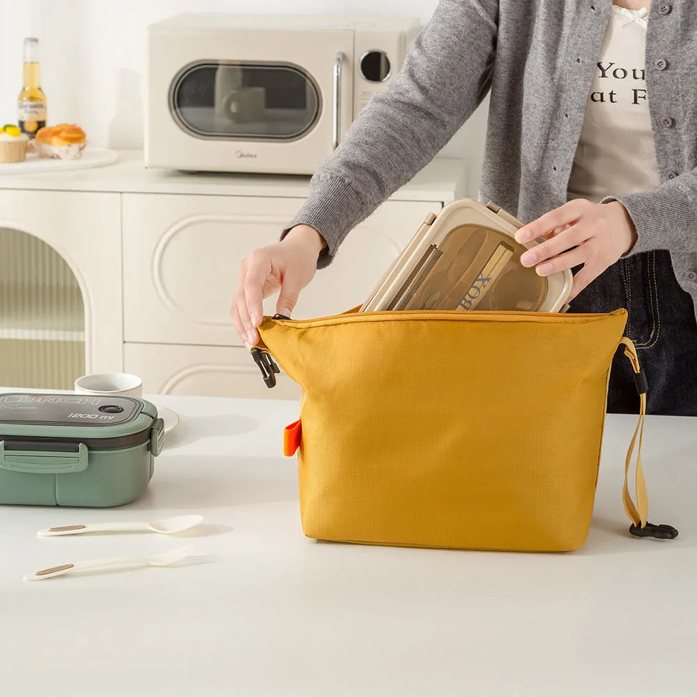 Army Green Japanese-style insulated lunch bag with a wide top opening on a grey background.