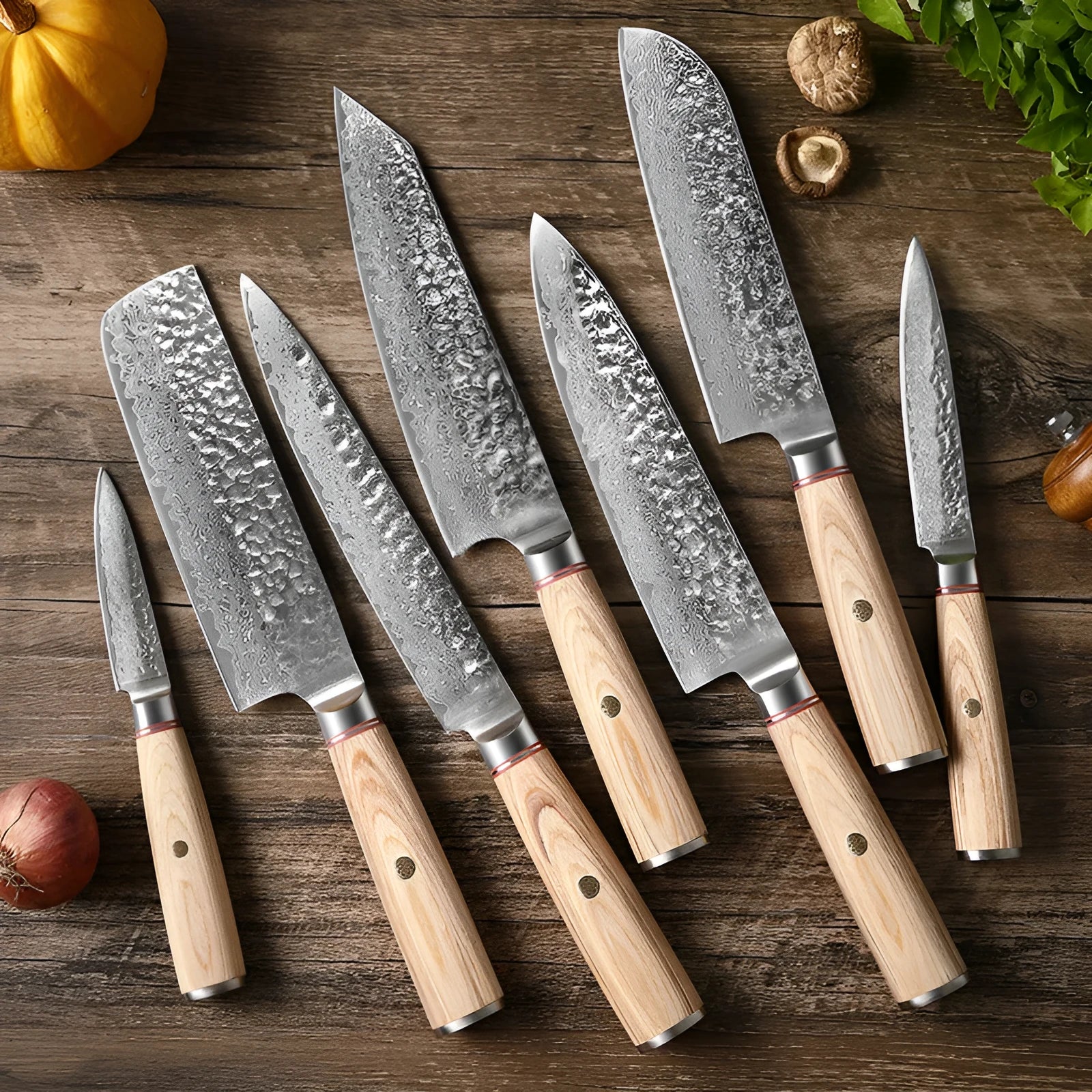 Damascus steel kitchen knife set of 7 with patterned blades and wooden handles on a dark surface