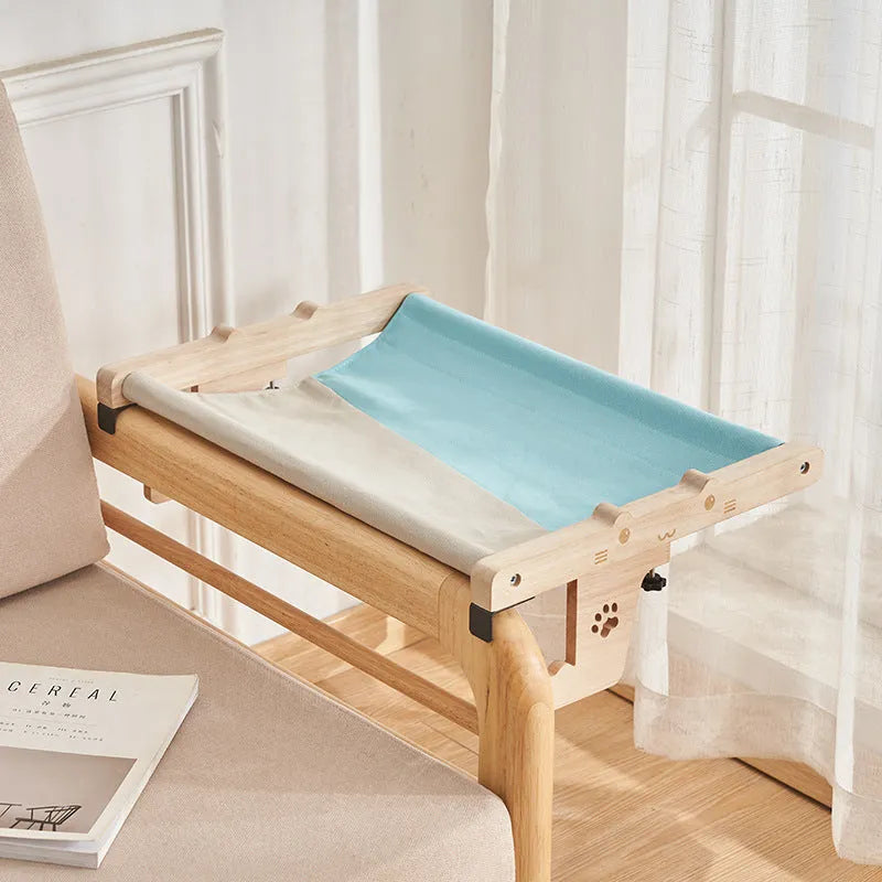 Wooden framed cat hanging hammock bed mounted on a window sill, available in seven style variations.