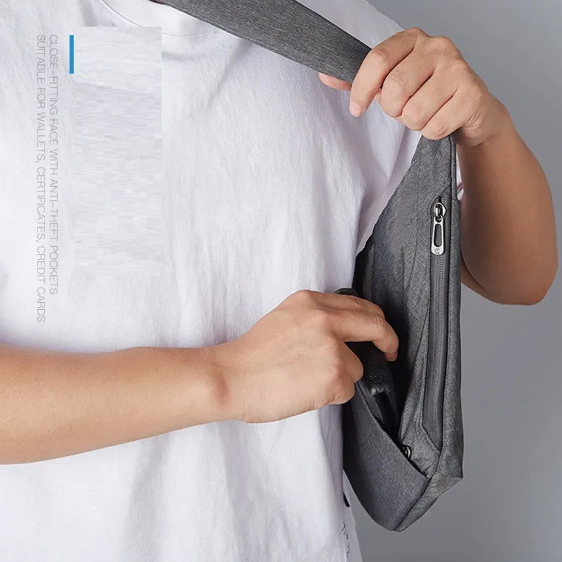 Dark gray right-shoulder crossbody chest bag with anti-theft function, polyester lining, file bag and sandwich zipper bag.