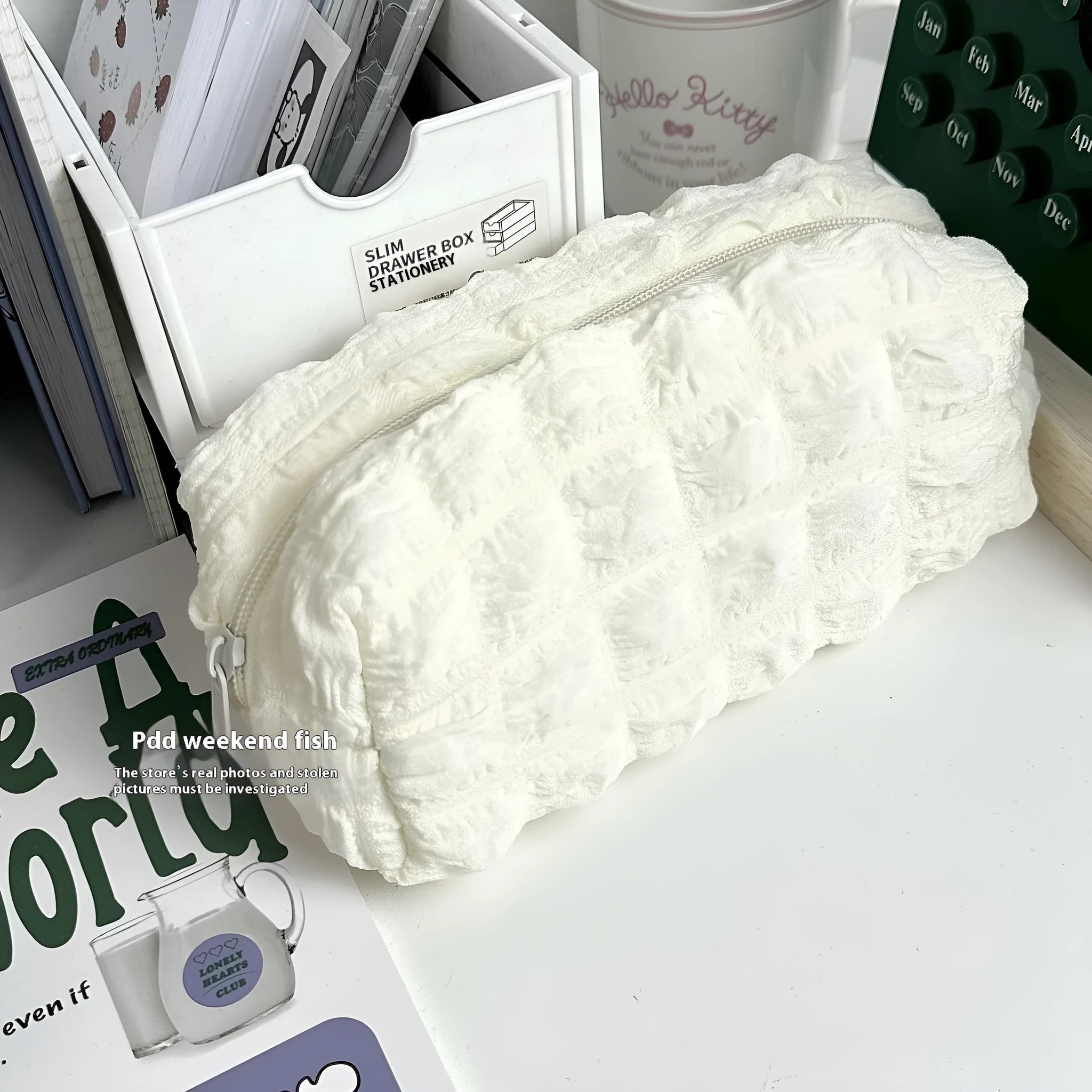Fabric pencil case with cream puff design in beige and black colour options
