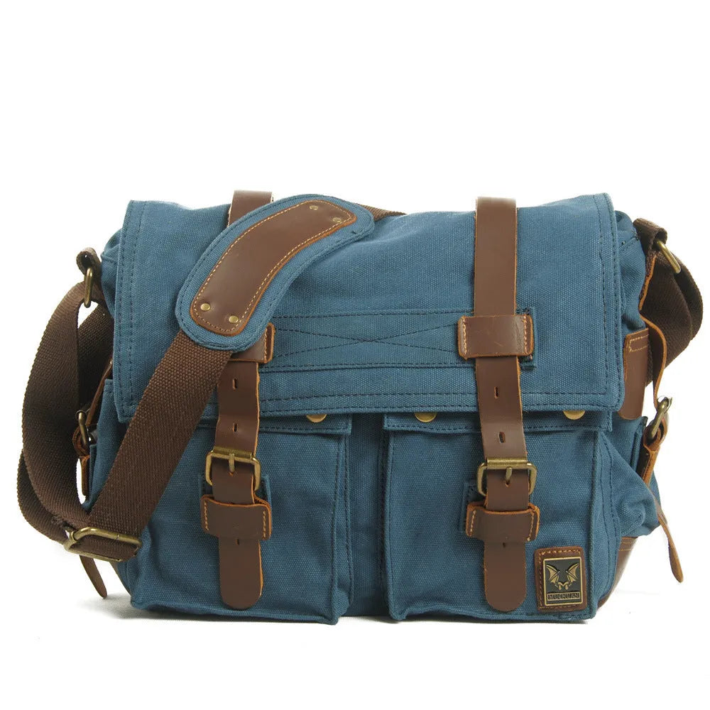 Men's retro canvas crossbody shoulder bag with flap closure and cowhide detailing in multiple colour options