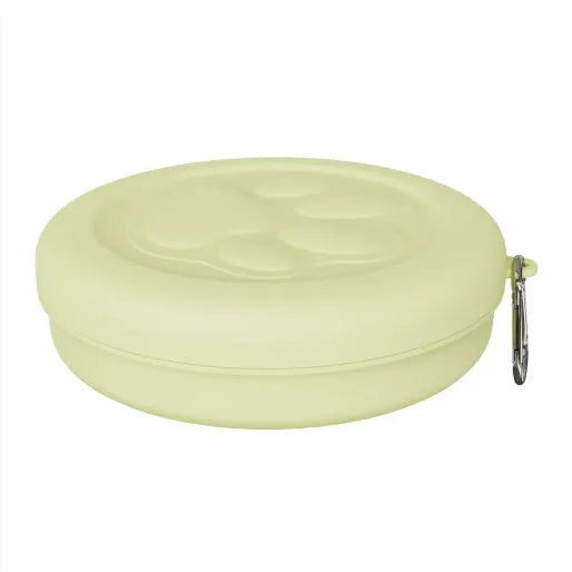 Portable dual-colour dog bowl set with attached snack box in light green and pink.