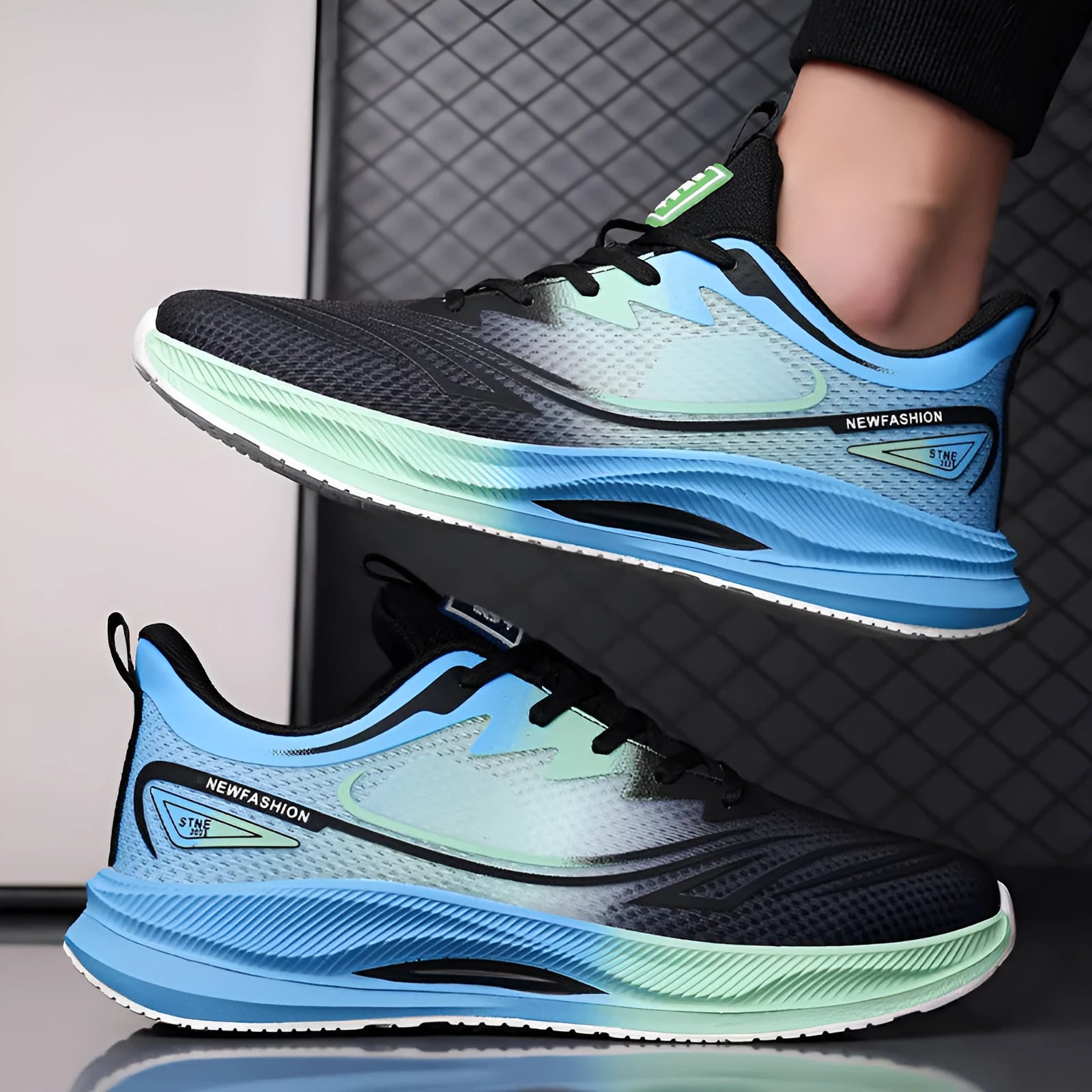 Men's solid colour casual shoe with a woven mesh upper and a low rubber sole.