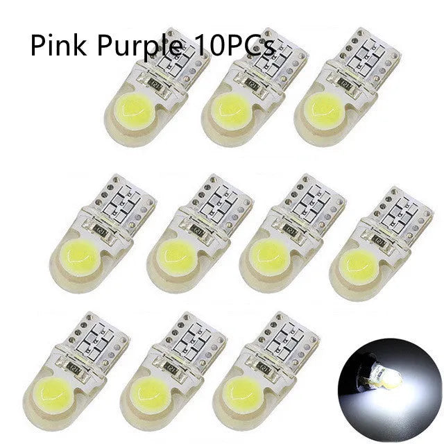 Ten T10 wedge base LED bulbs with silicone housing in a pack, showing multiple colour options