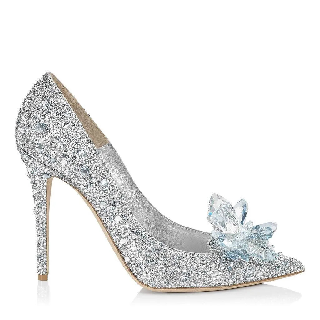 Gold women's pointed toe stiletto heels with rhinestone and sequin decoration on a 7cm heel.
