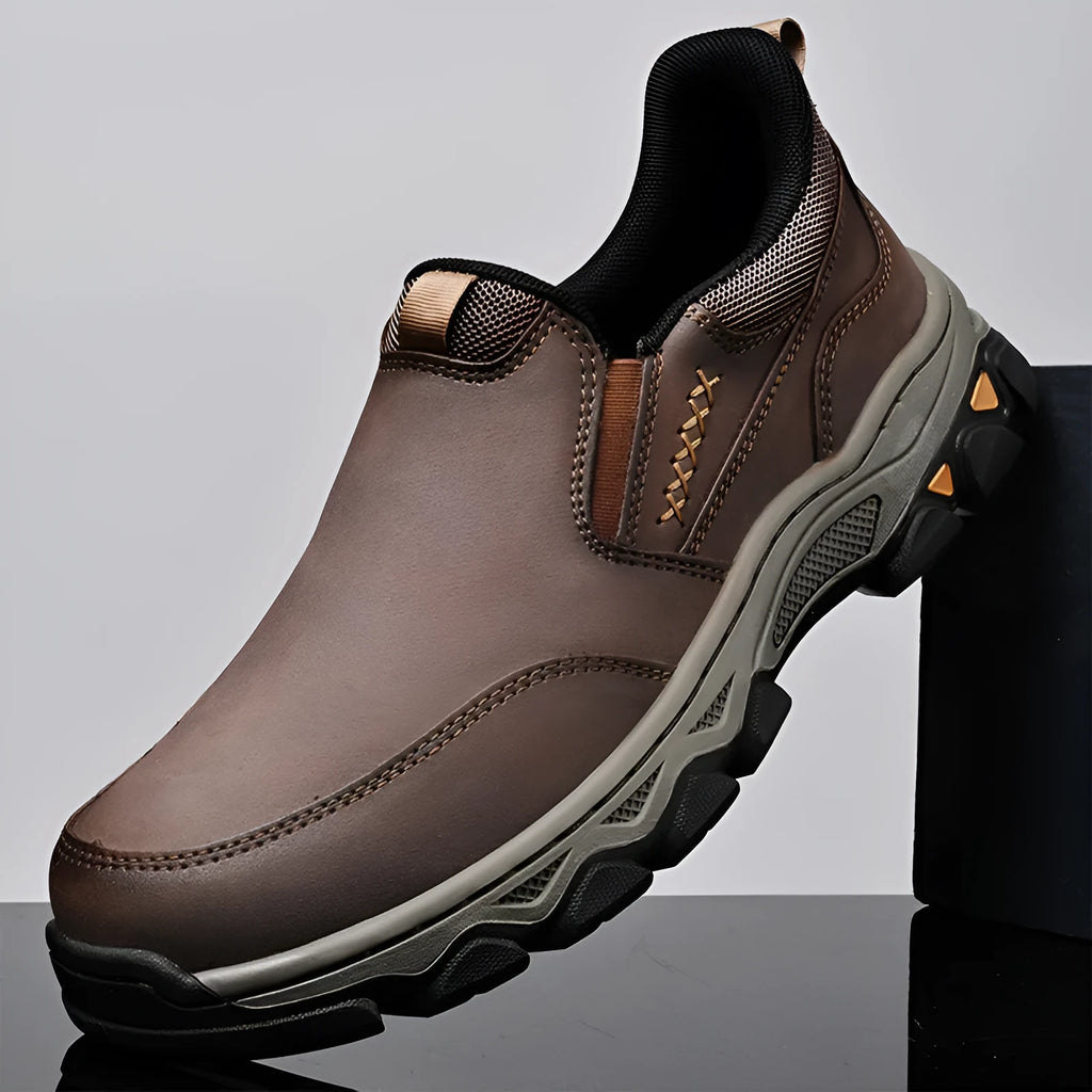 Men's dark brown casual leather shoes with a flat heel and round toe on a white background