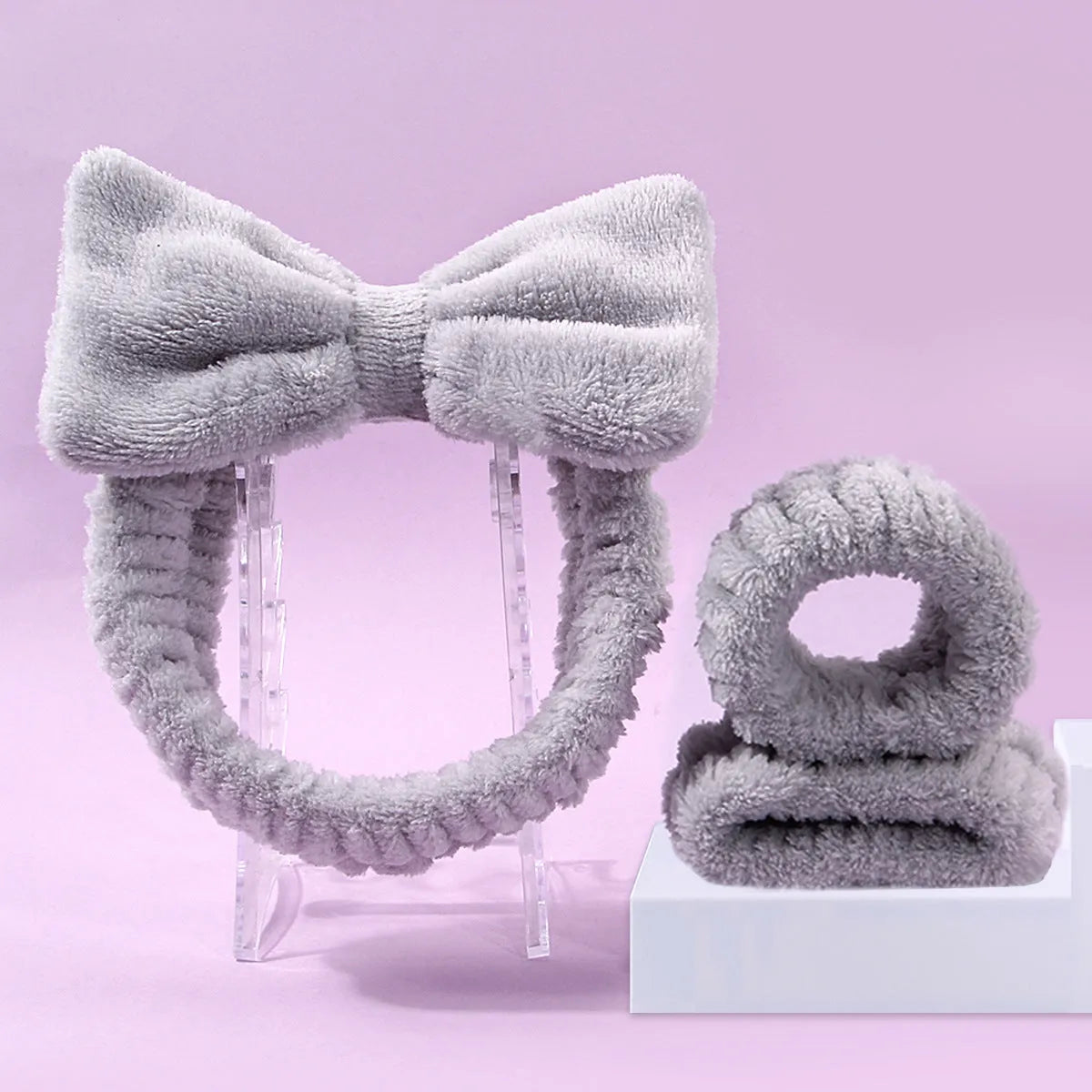 Facial brush set with coral fleece hair band in multiple colours including purple, grey, white, and pink