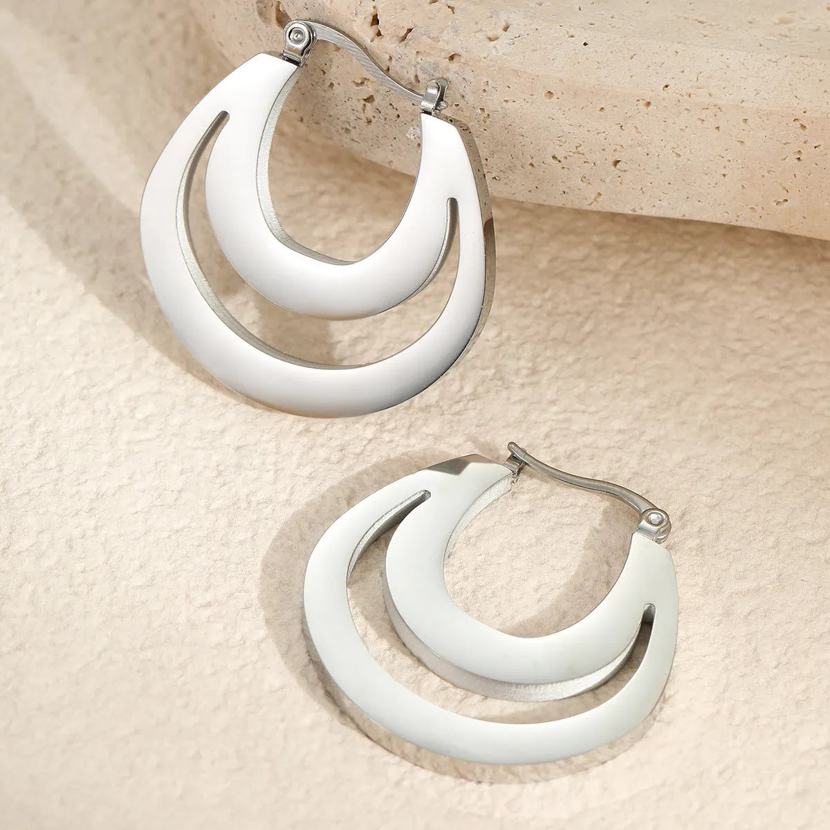 Geometric French earrings with round ring design in gold or steel metallic finish