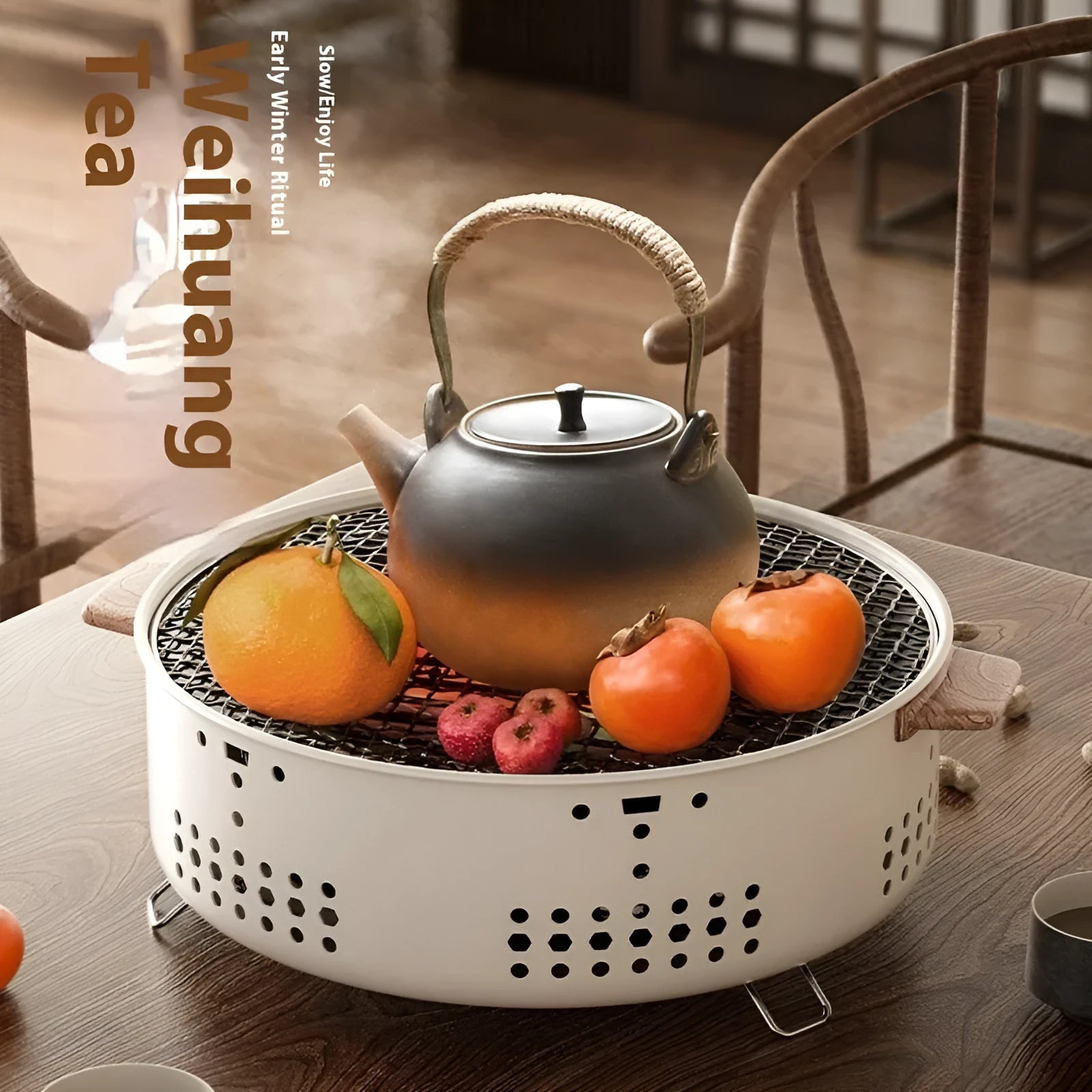 Compact round indoor charcoal stove with removable metal grill rack, for smokeless tabletop cooking.