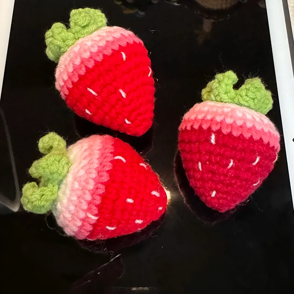 Plush wool strawberry pendant keychain charm in pink or red colour.