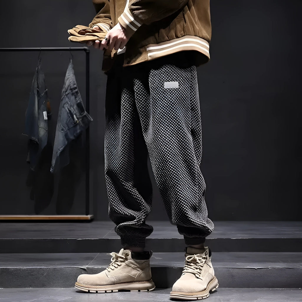 Men's grey ankle-tied casual sport sweatpants with straight leg design on hanger