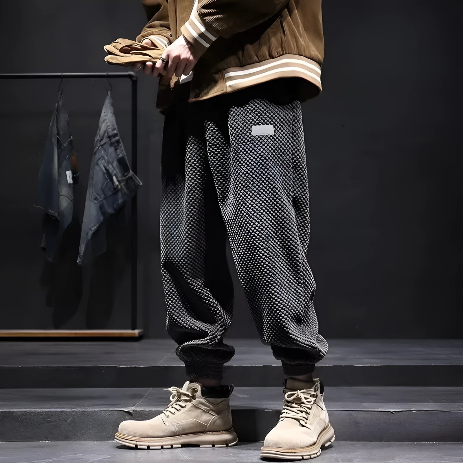 Men's grey ankle-tied casual sport sweatpants with straight leg design on hanger