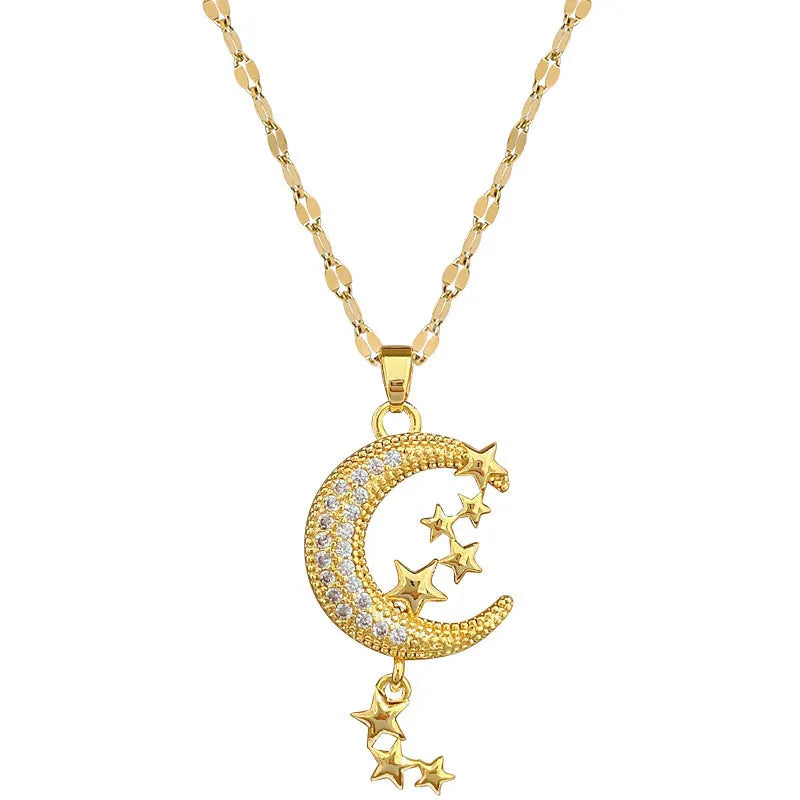 Geometric moon pendant necklace with crystals and tassel detail on an adjustable stainless steel chain.
