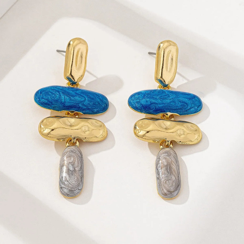 A pair of multicolour geometric stud earrings for women with a zinc alloy base and electroplated finish.