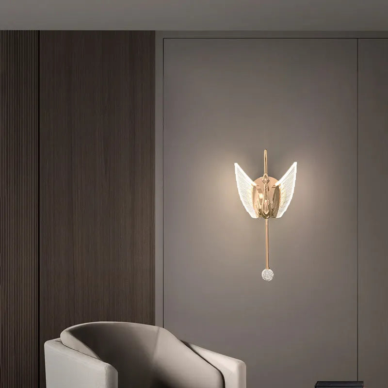 Modern gold swan neck bedside wall lamp with an acrylic shade and dimmable LED light.