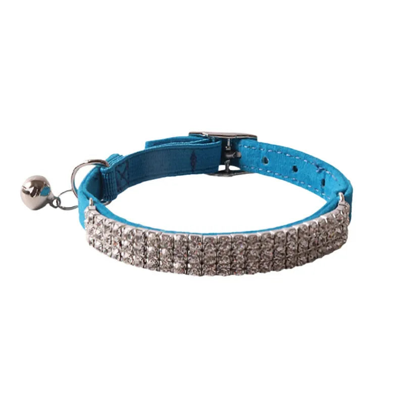 Flocked elastic cat collar with quick-release buckle shown in pink, length 28cm.