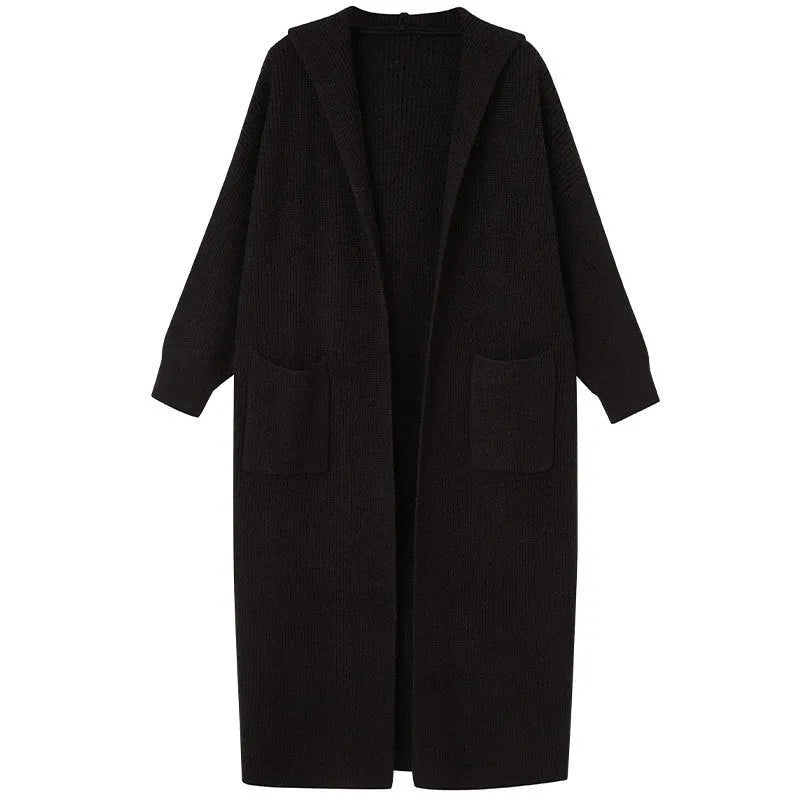 Long grey knitted hooded cardigan trench coat on a hanger, showing loose fit and length.