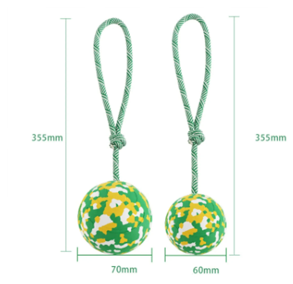 Natural rubber dog ball on nylon rope for interactive fetch and tug games