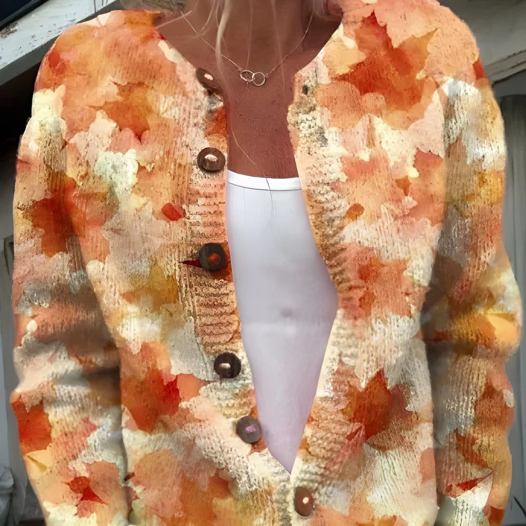 Yellow digital print cardigan coat with 3D pattern effect, shown on a hanger.