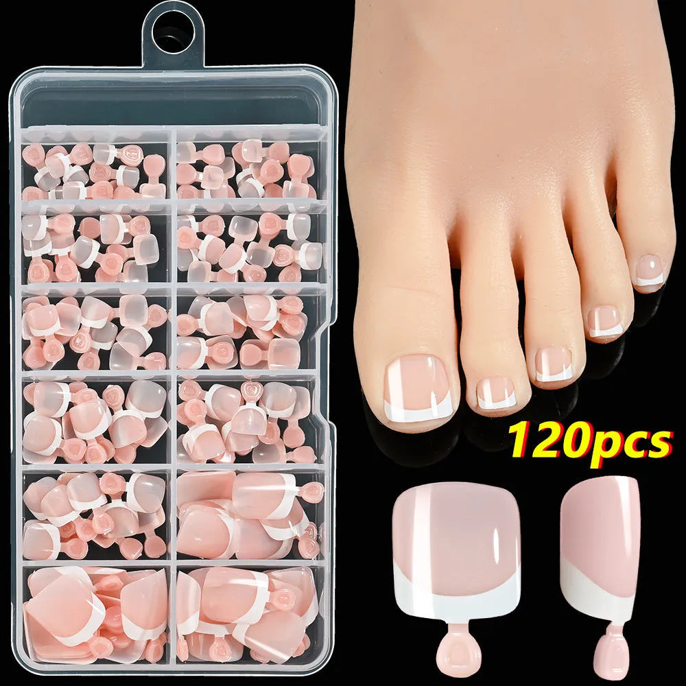 Open box showing 120 French white edge nude square false toe nail pieces in various shades.