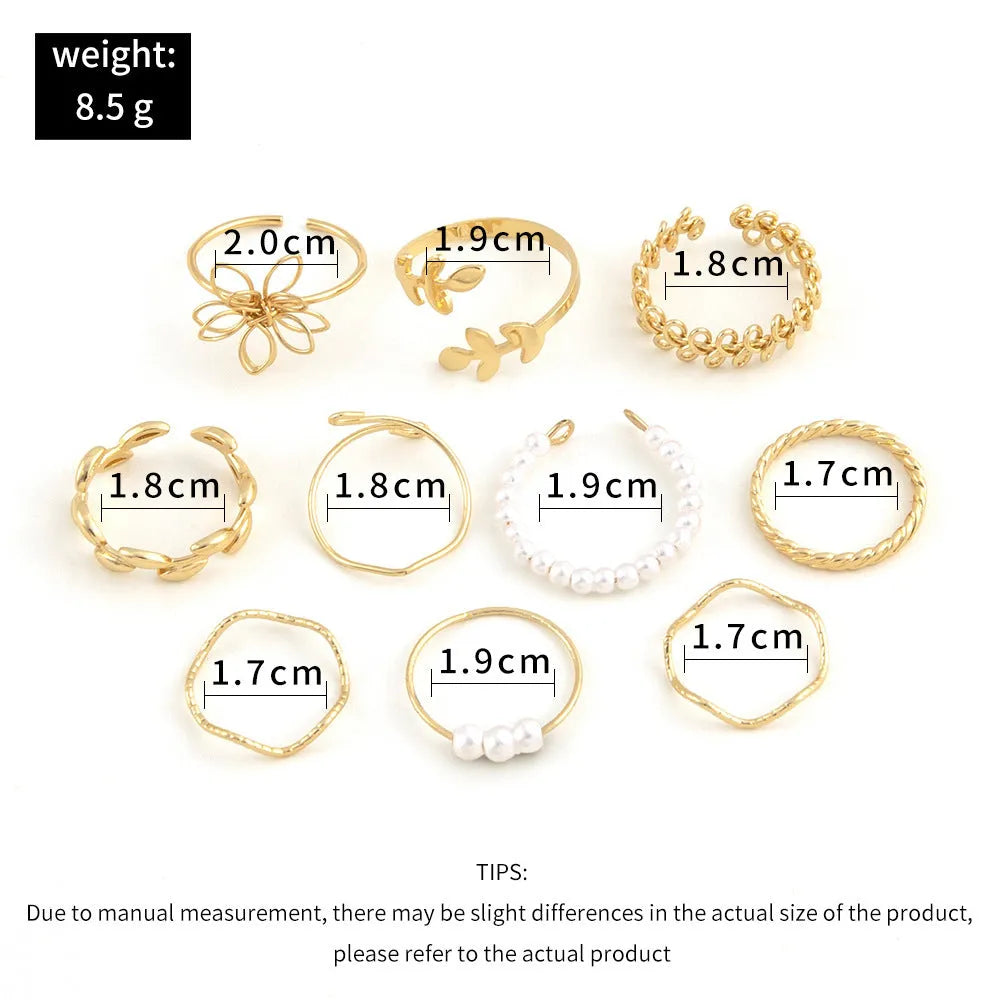 Gold colour openwork flower ring with detailed floral design and glossy electroplated finish